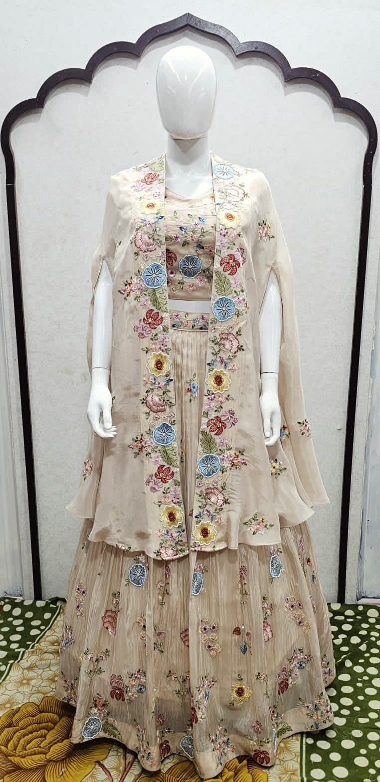 “Rangrez Reverie: Multicolor Resham Lehenga with Flowing Organza Cape” Evokes artistry and movement; great for festive and bridal edits.