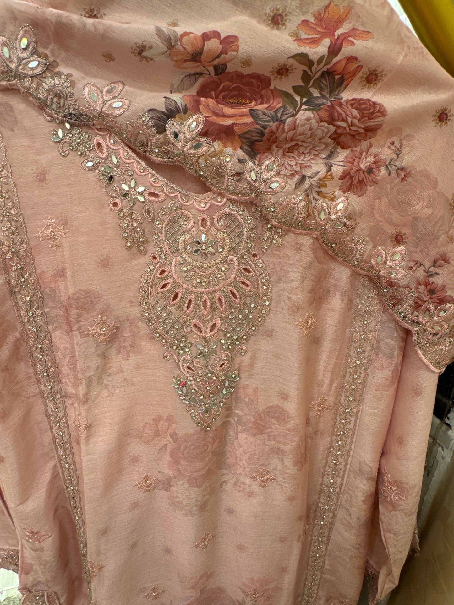 Meherbaan collection dn:- 002 Peachish Pink Chinnon Embroidered Mirror Work Palazzo Kurta Set   . Where floral charm meets timeless craftsmanship.